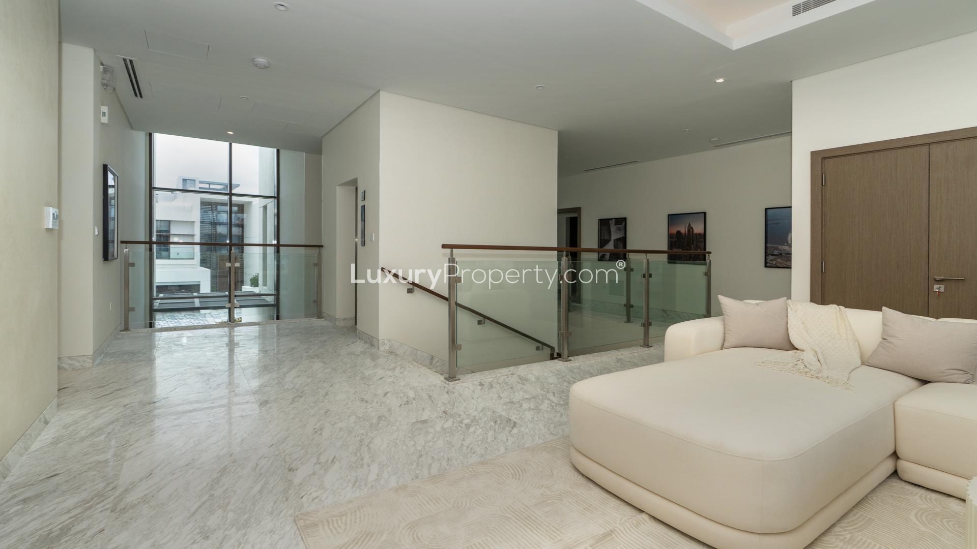 Luxurious living room in District One villa, spacious seating, elegant decor, modern chandelier