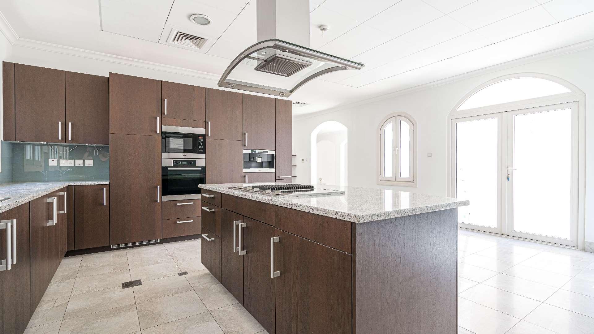 Villa exterior with private pool in Jumeirah Golf Estates, Fire community, for rent