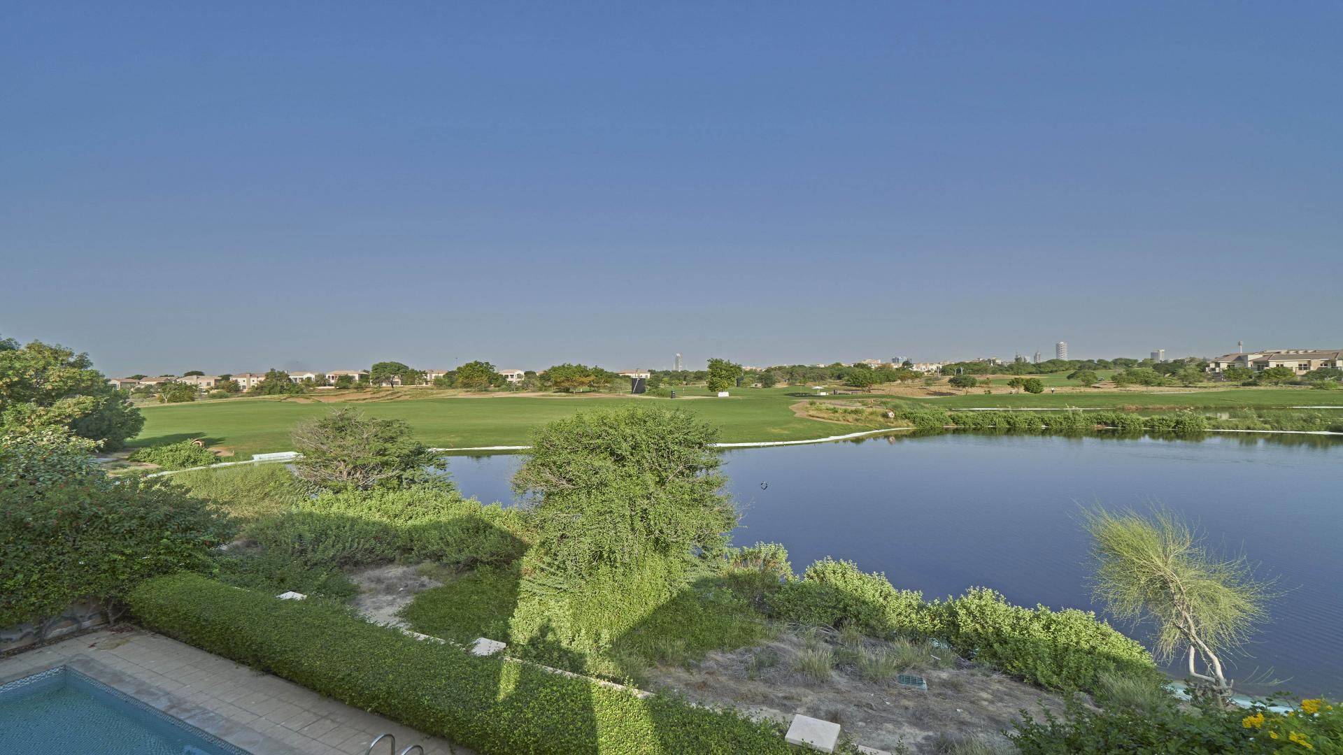 Elegant Sienna Lakes Villa interior with pool and golf course view, Jumeirah Golf Estates