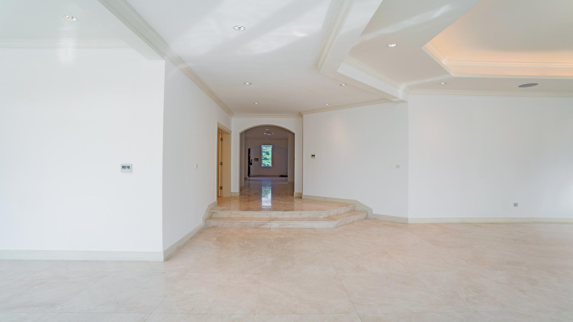Upgraded villa interior with elegant marble flooring, Jumeirah Golf Estates, Fire community