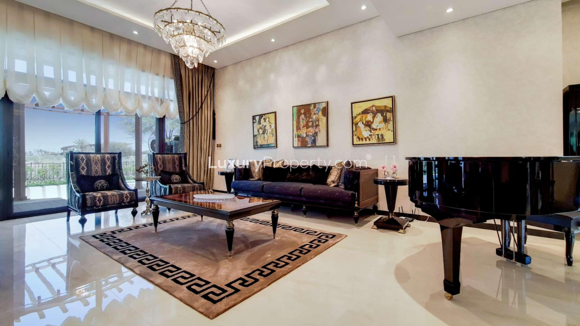 5-bedroom villa in Flora, Damac Hills with private pool and modern outdoor seating area