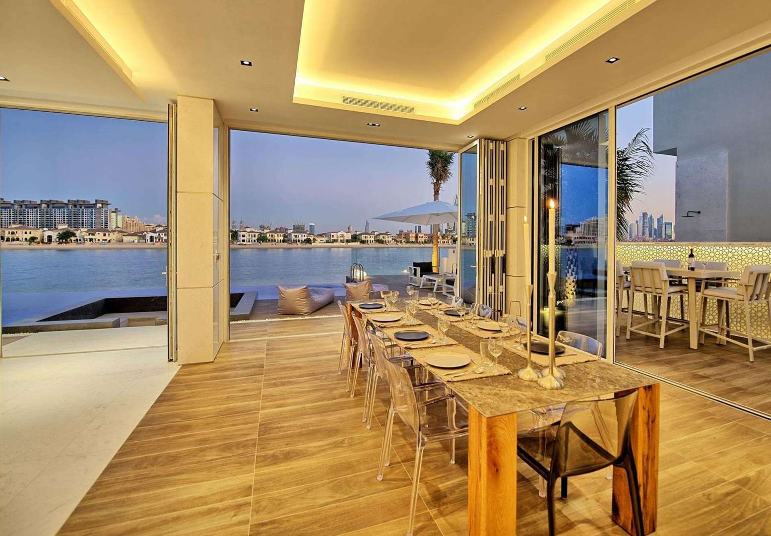 Luxury dining area with beach view in Palm Jumeirah villa for rent