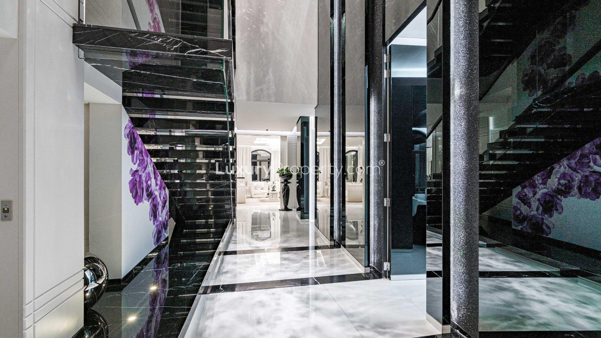 Fully upgraded 3-story villa exterior in Palm Jumeirah's Garden Homes, featuring modern architecture