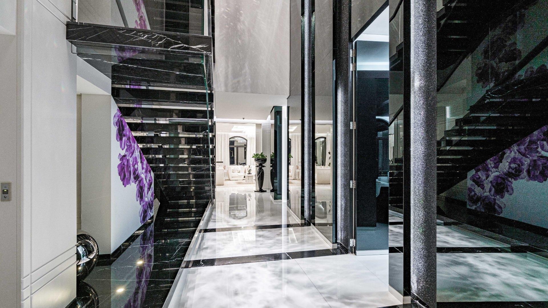 Fully upgraded 3-story villa exterior in Palm Jumeirah's Garden Homes, featuring modern architecture