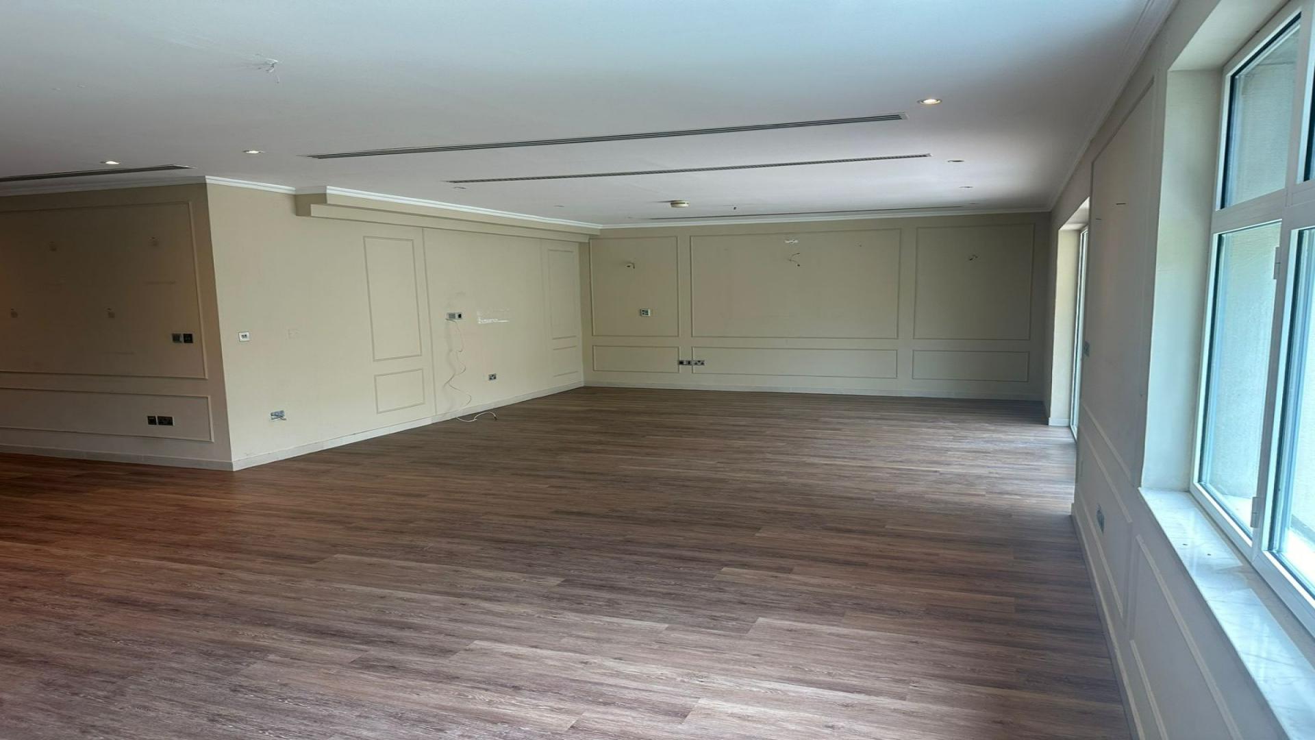 Exterior view of single row villa with pool in Legacy Jumeirah Park, available for rent