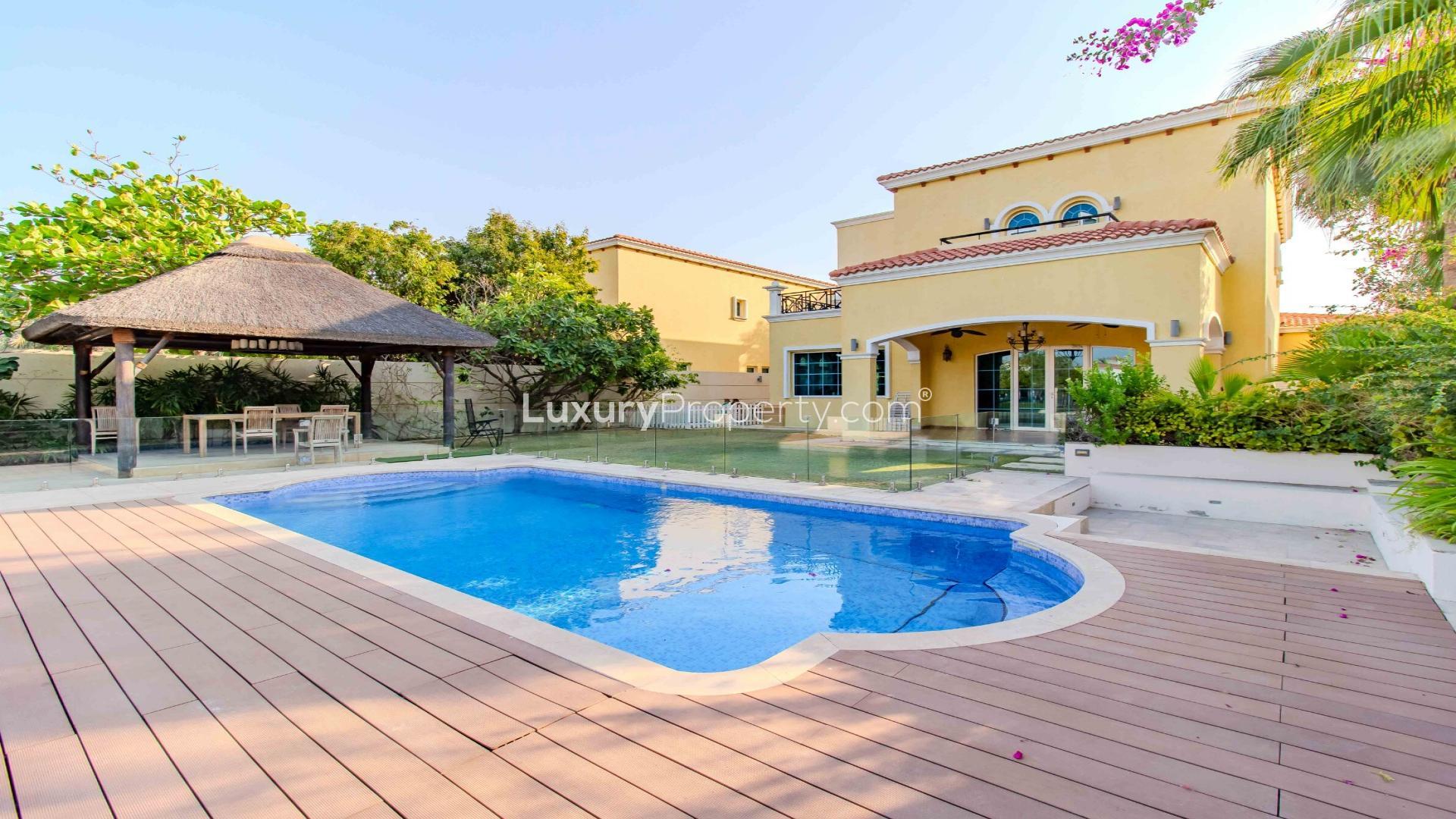 Beautiful villa pool with lake view in Jumeirah Park Legacy community