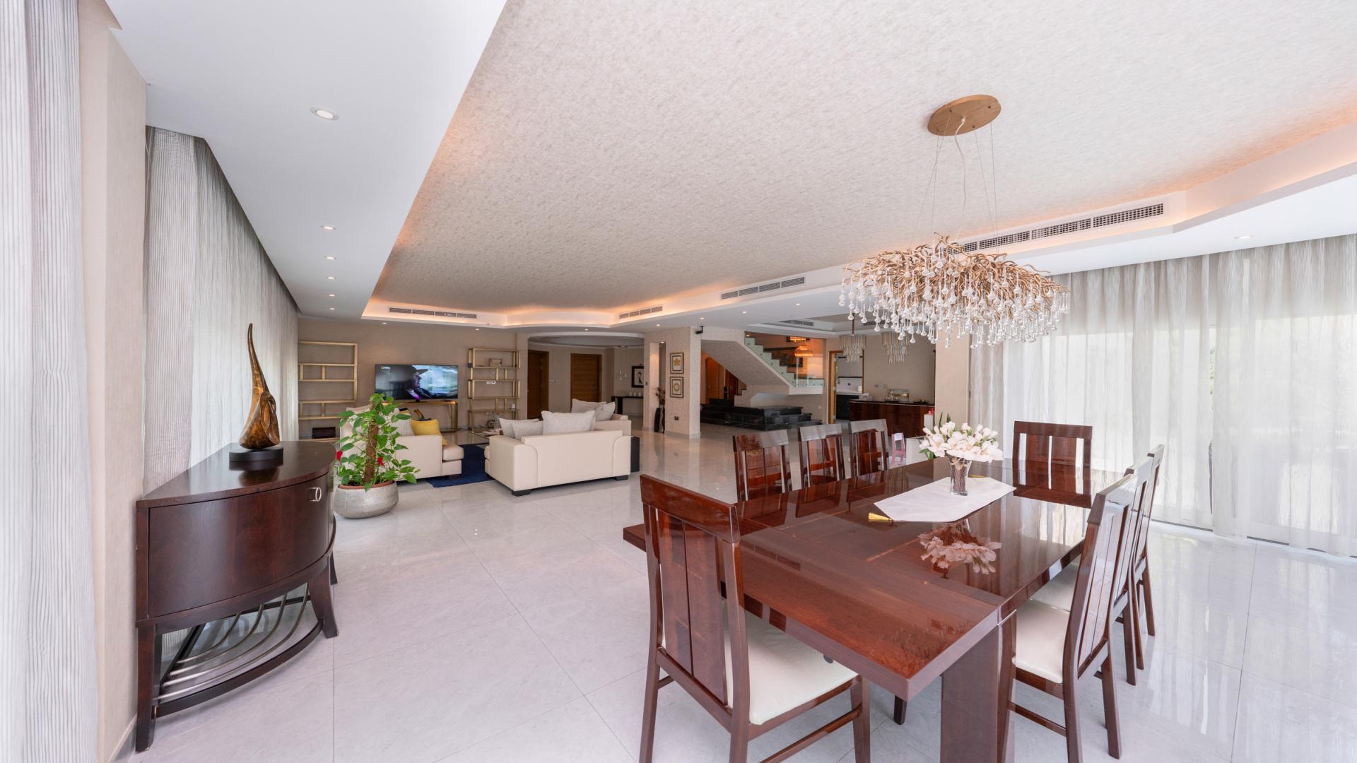 Upgraded 5-bedroom villa exterior with pool in Legacy, Jumeirah Park for rent