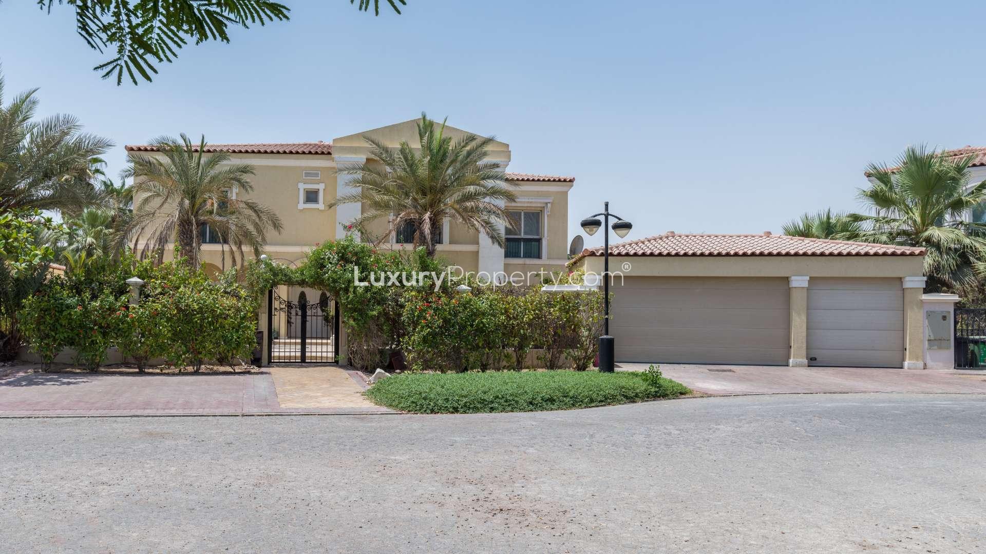 "Elegant villa interior with luxurious decor in Green Community West, available for rent.",Stunning 5-bedroom villa exterior with lush landscaping in Green Community West for rent