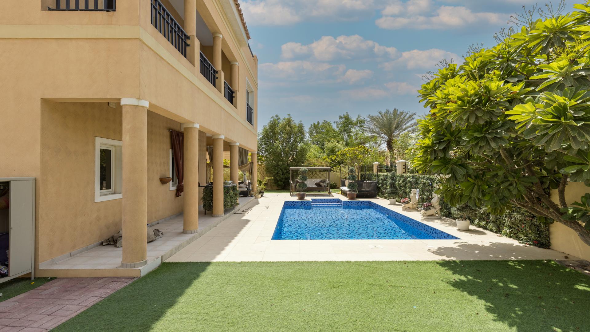 Exterior view of 5-bedroom villa with pool and landscaped garden in Hacienda, The Villa