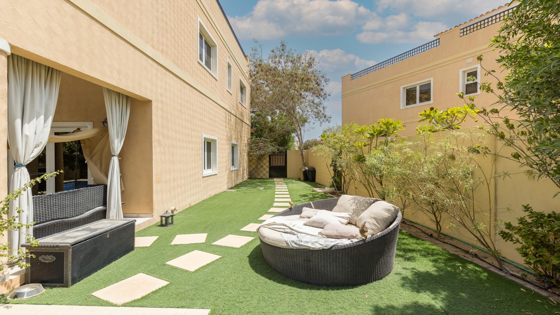 Landscaped garden with seating area in exclusive 5-bedroom villa, Hacienda, The Villa community