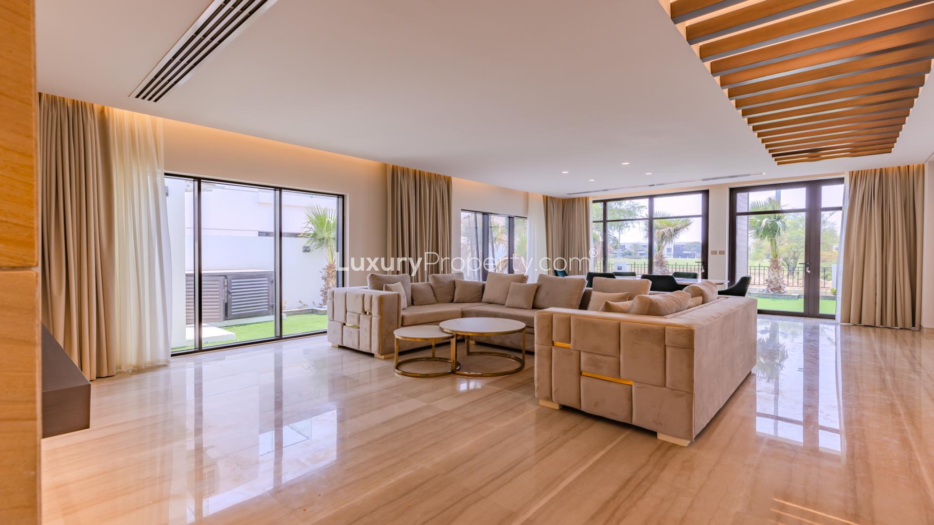 Luxury Fendi Villa exterior with garden view in Trevi, Damac Hills, for rent
