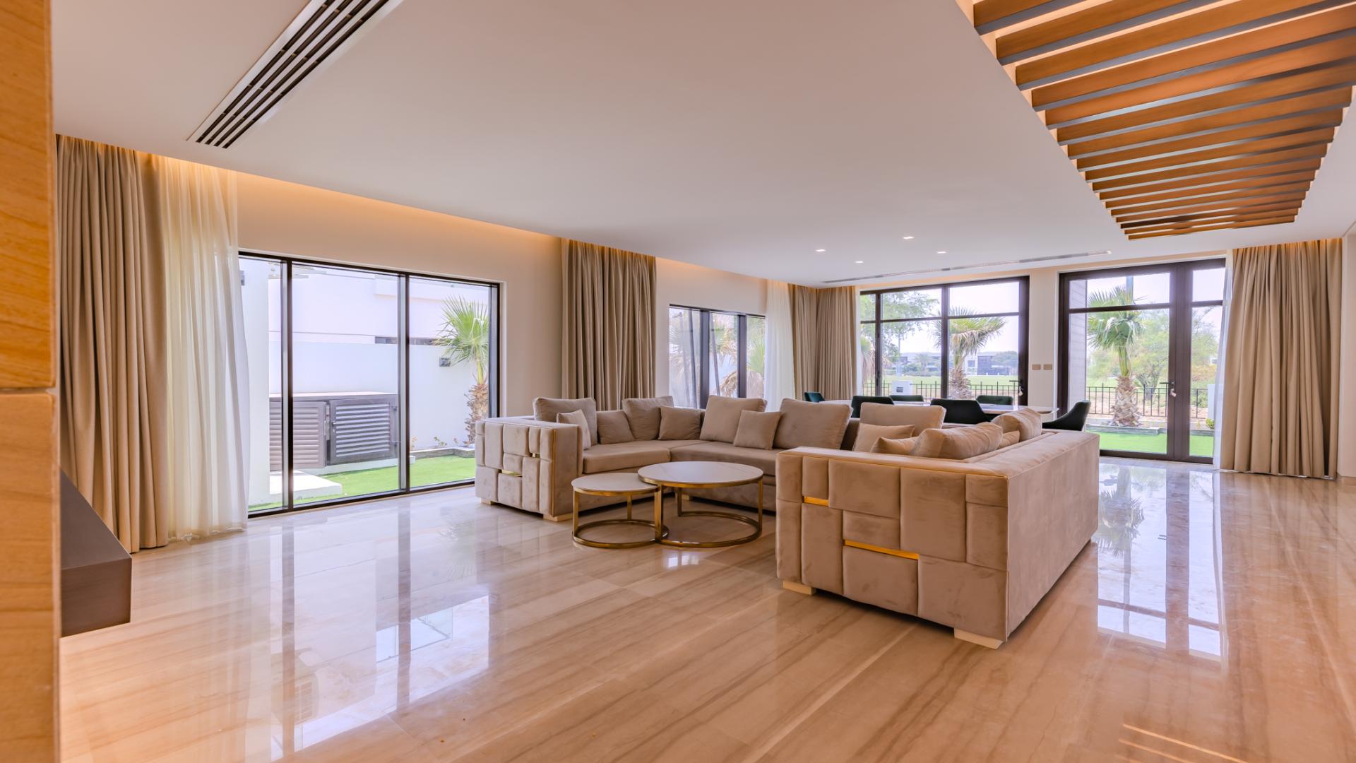 Luxury Fendi Villa exterior with garden view in Trevi, Damac Hills, for rent