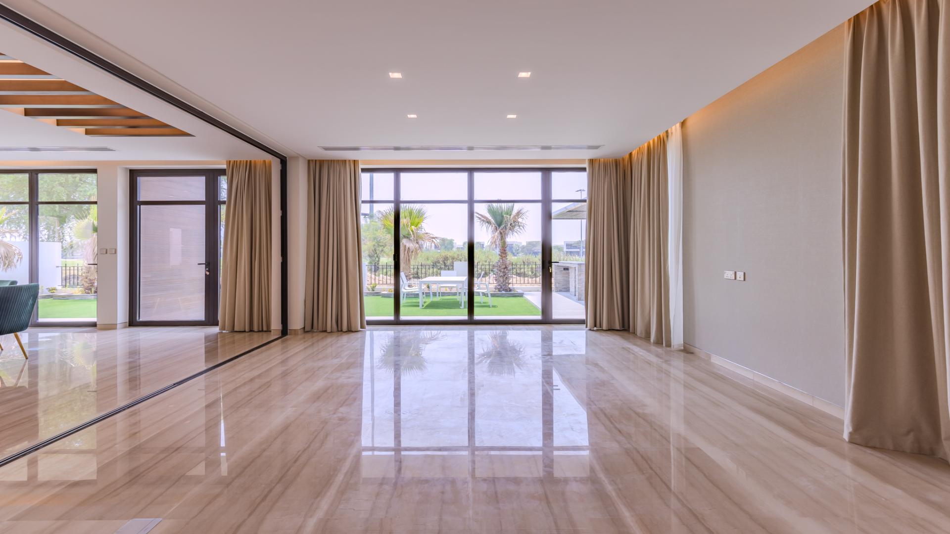 Spacious living area in luxury Fendi villa, Trevi, Damac Hills with golf course view