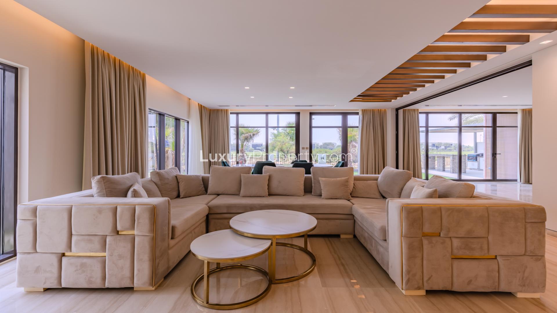 N/A,Luxurious living room in Fendi Villa, Damac Hills, overlooking golf course, sleek modern design
