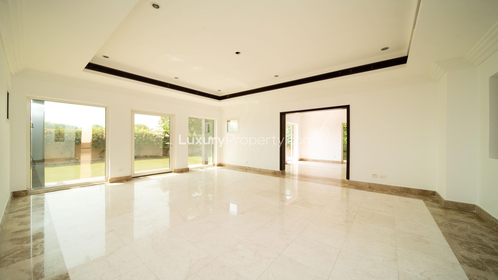 Bright, spacious living area in E1 Hattan Villa, The Lakes, Emirates Living for rent