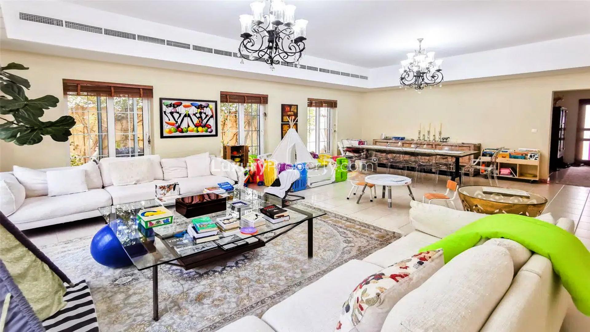 Luxurious villa patio with pool and seating in Terra Nova, Arabian Ranches