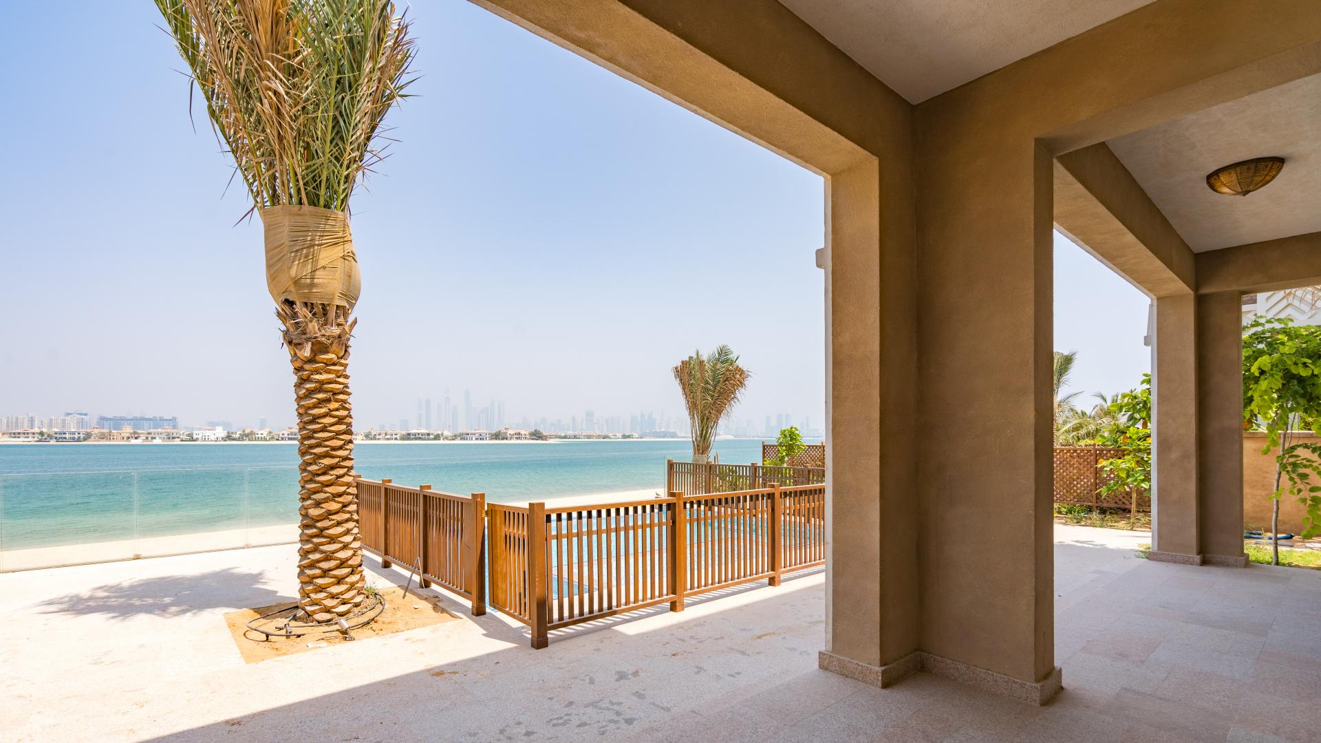 Luxurious beachfront villa pool with skyline views, Palm Jumeirah, Kingdom of Sheba