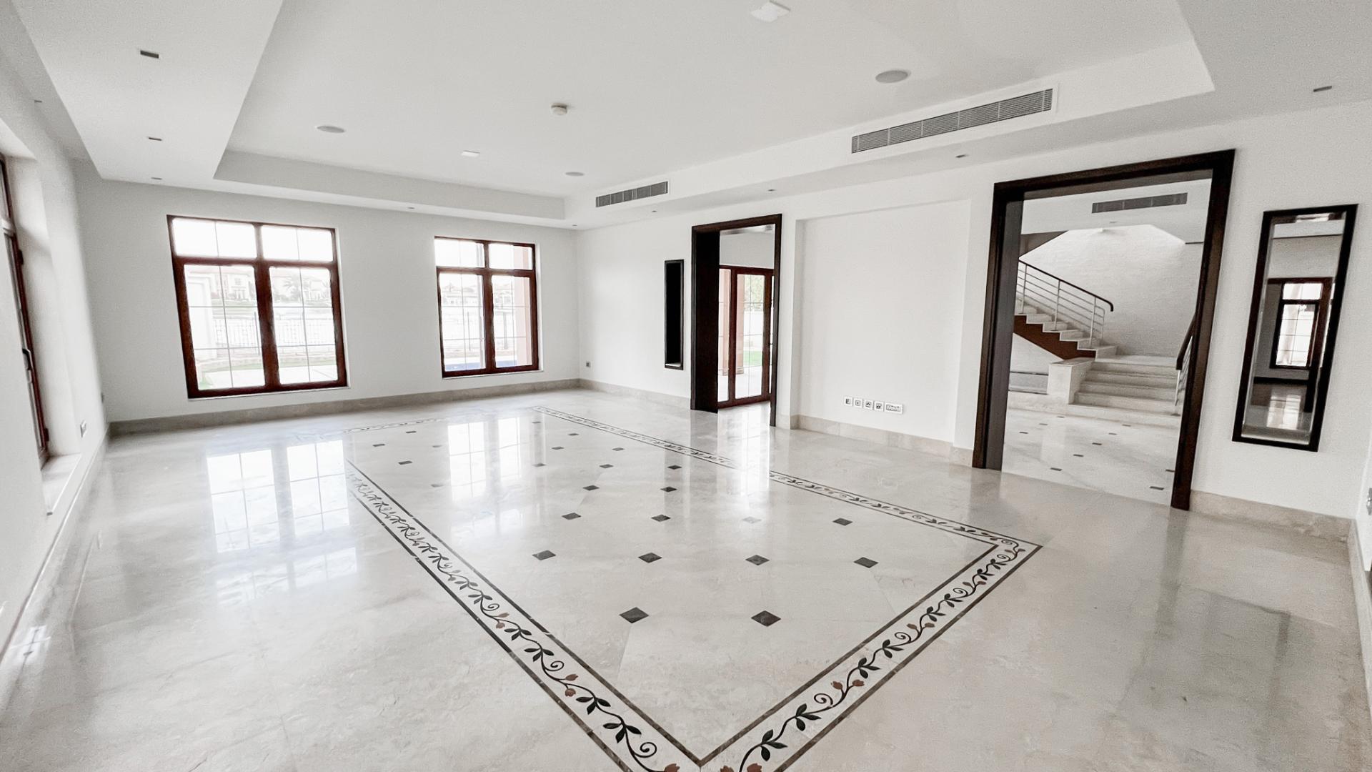 Luxurious interior of 5-bedroom villa in The Mansions, Jumeirah Islands, with pool view