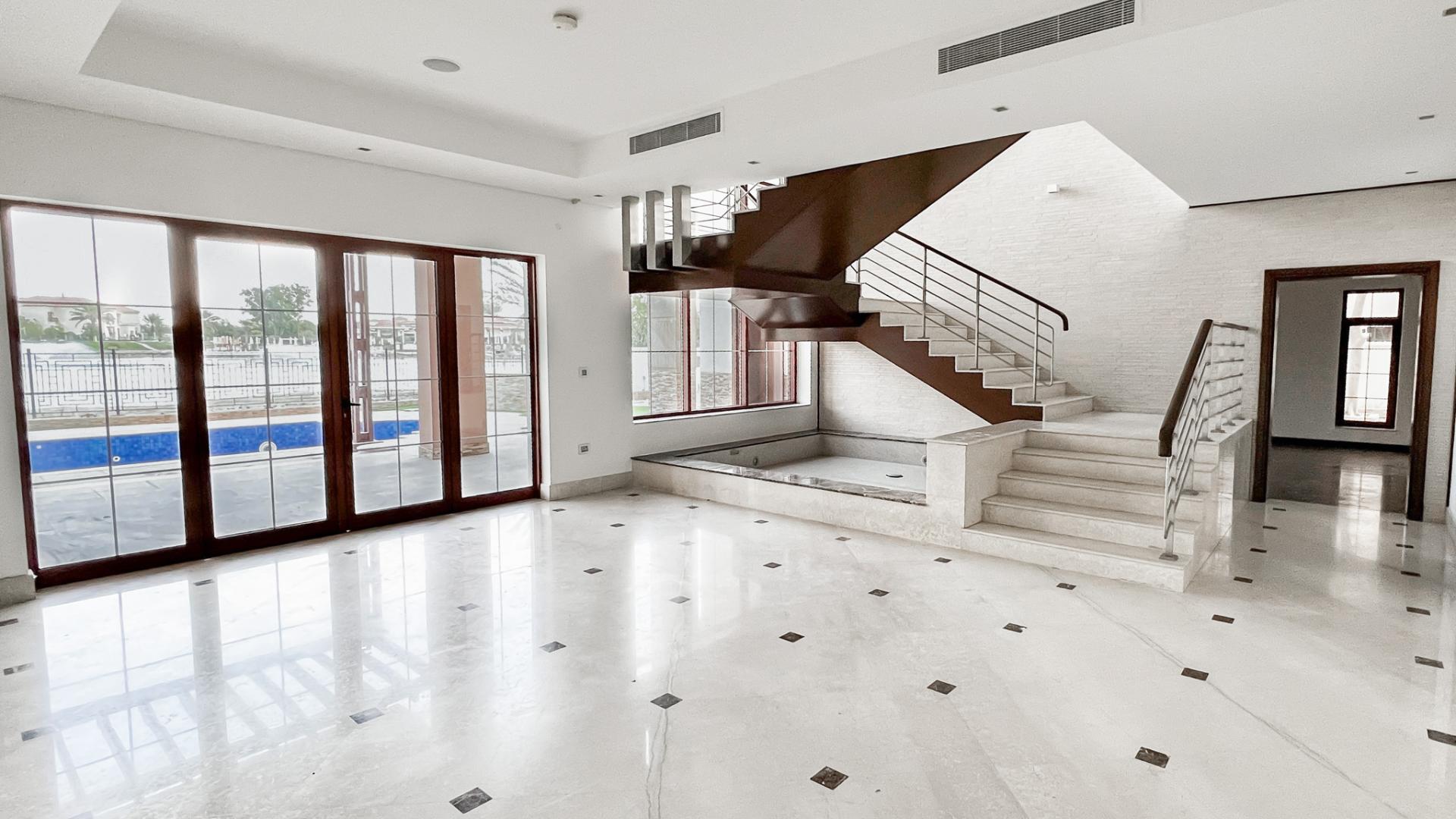 Grand villa view overlooking serene lake in The Mansions, Jumeirah Islands, Dubai