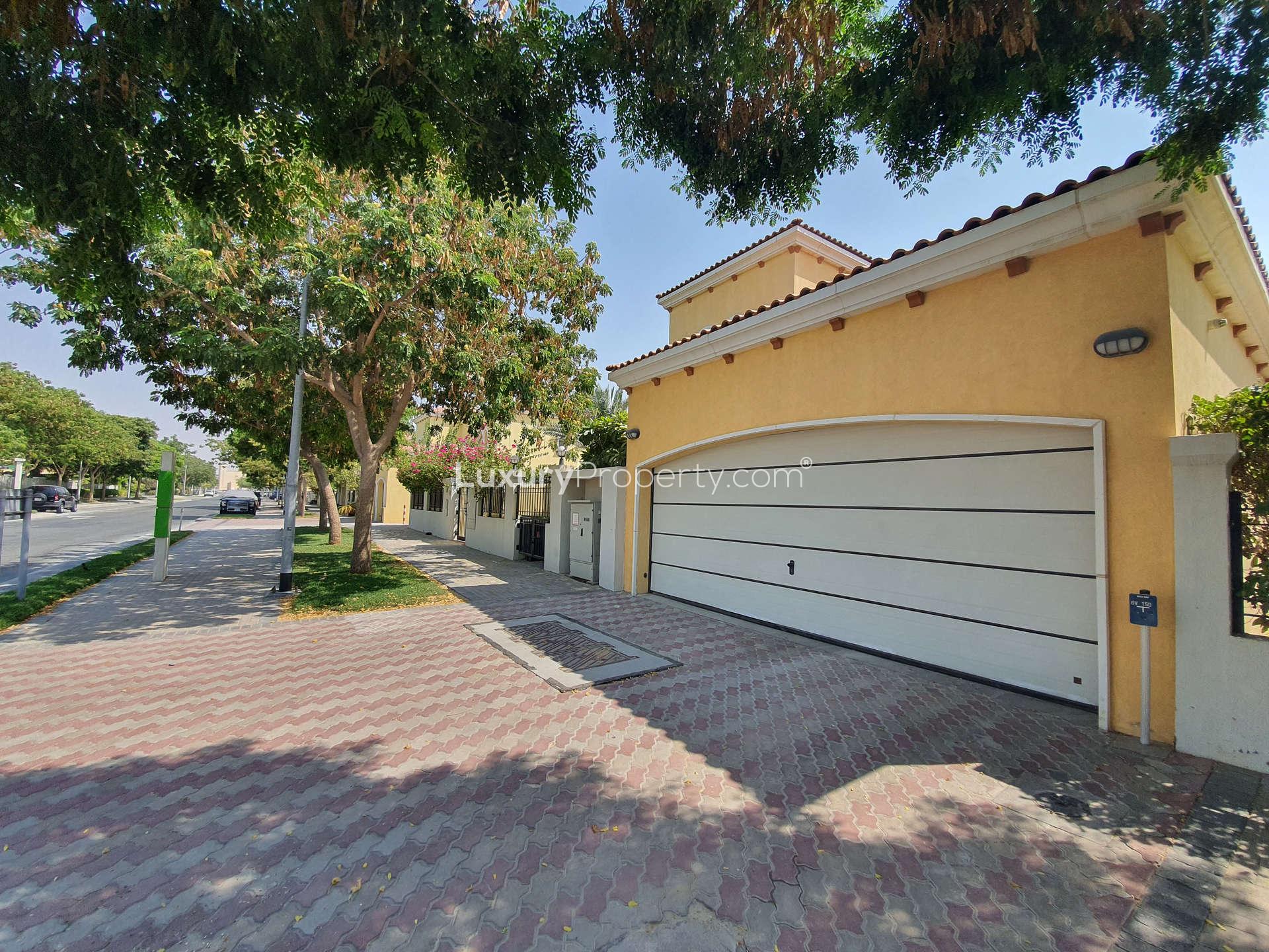 Spacious 5-bedroom Legacy Villa exterior with driveway in Jumeirah Park, available for rent