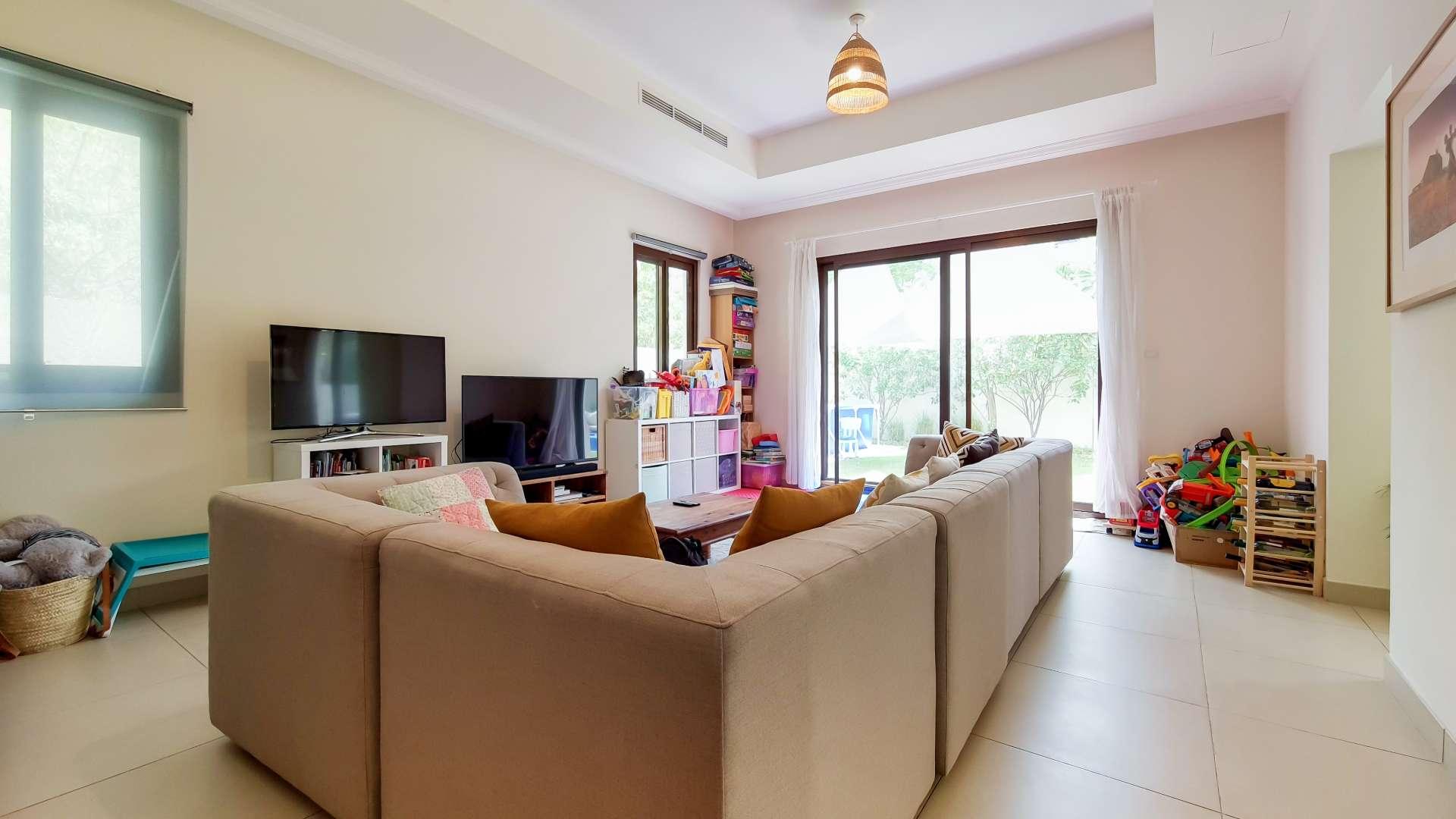 "Spacious balcony view from exclusive 4-bedroom villa in Lila, Arabian Ranches 2 for rent.",Living room in exclusive 4-bedroom villa, Lila, Arabian Ranches 2, available for rent