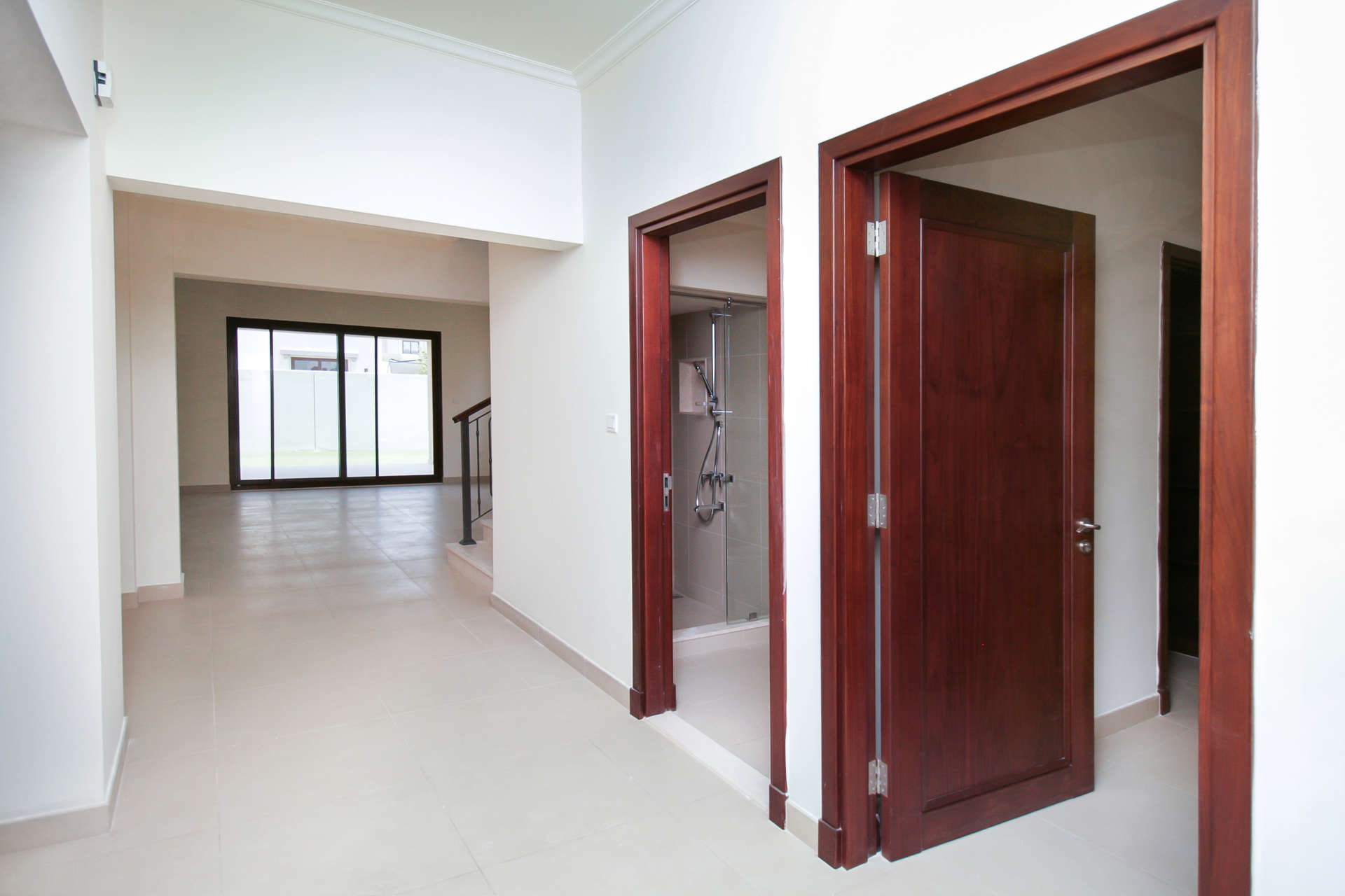 Spacious 5-bedroom villa exterior in Lila, Arabian Ranches 2, with green lawn