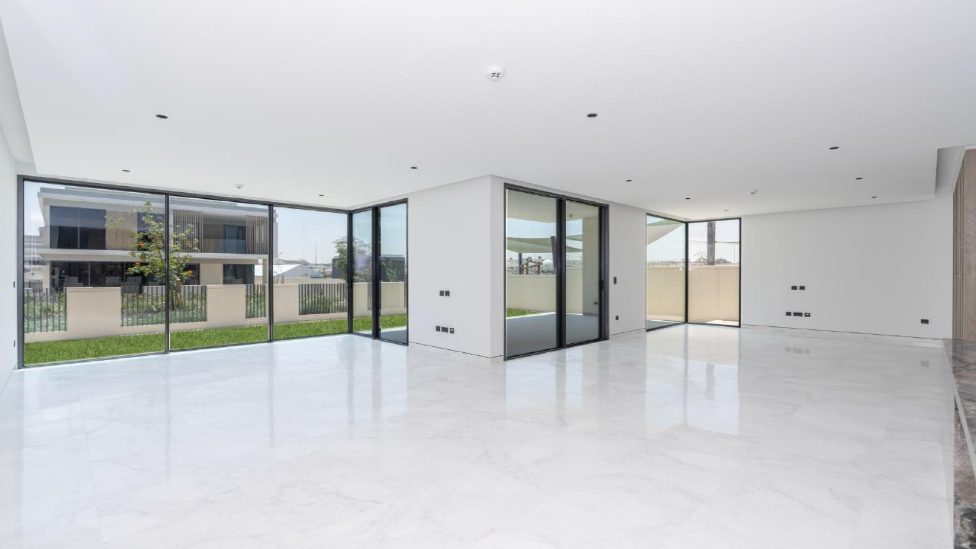 Vacant 5-bedroom villa with modern design and garden in Tilal Al Ghaf, Harmony 3