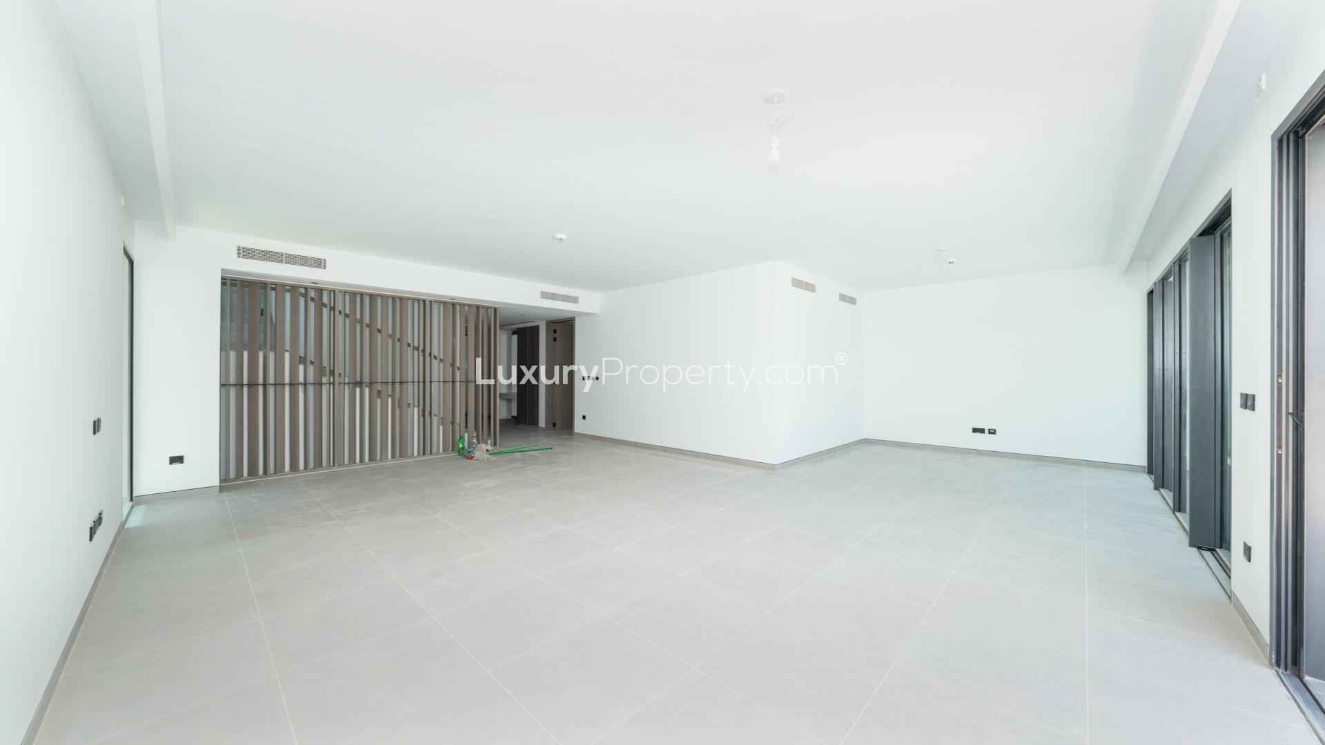 Spacious living area with large windows in Harmony Phase 3 villa, Tilal Al Ghaf