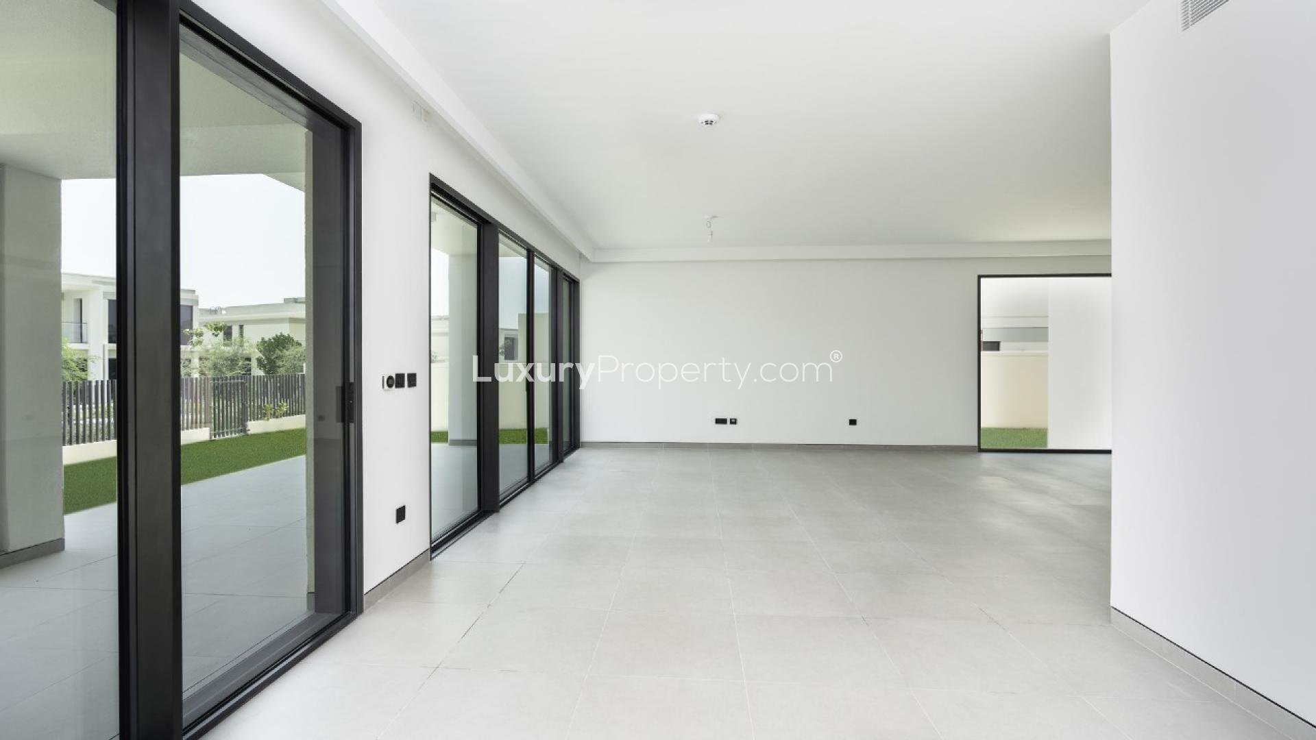 Vacant 5-bedroom villa exterior with garden in Tilal Al Ghaf, Harmony 3 community