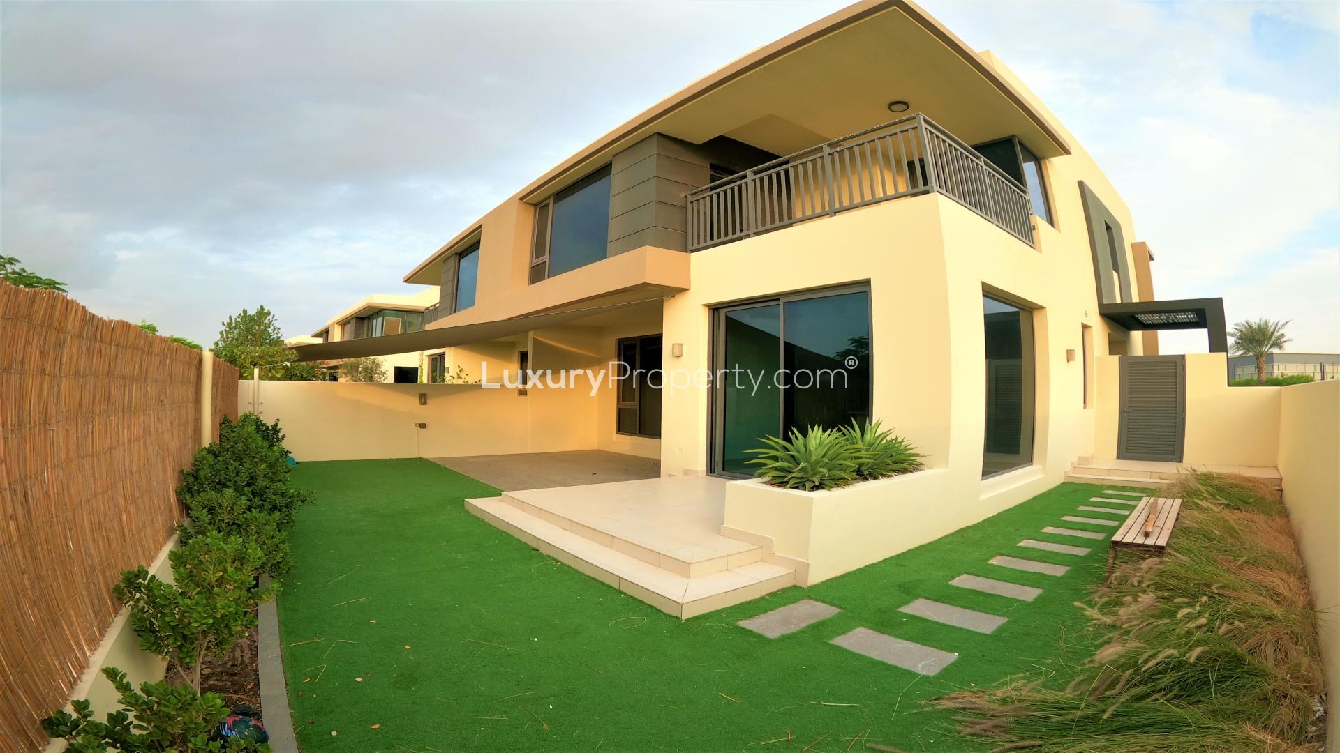 Modern villa balcony with landscaped garden view in Dubai Hills Estate, Maple community