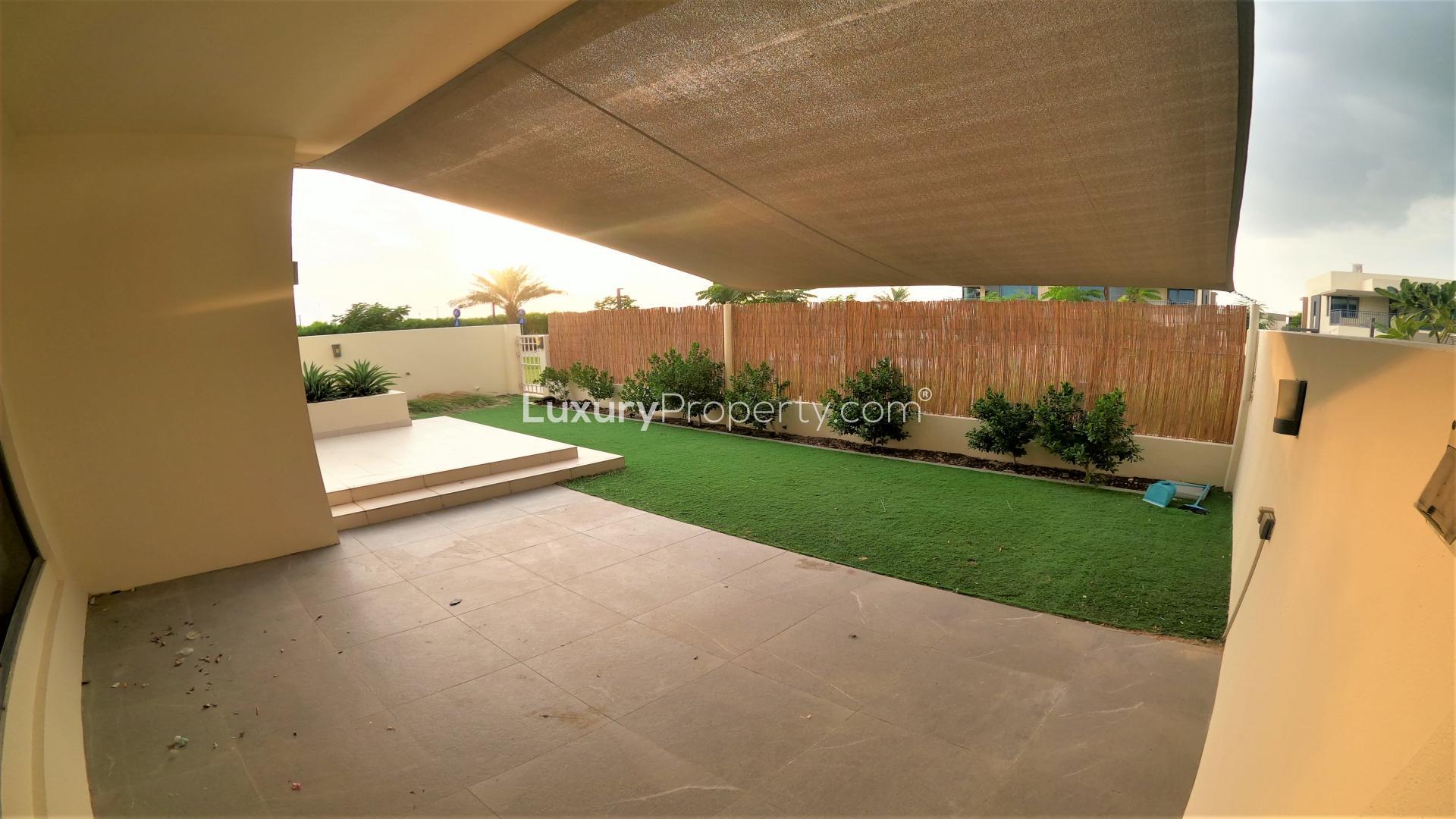 Modern villa patio with landscaped garden in Maple, Dubai Hills Estate, available for rent
