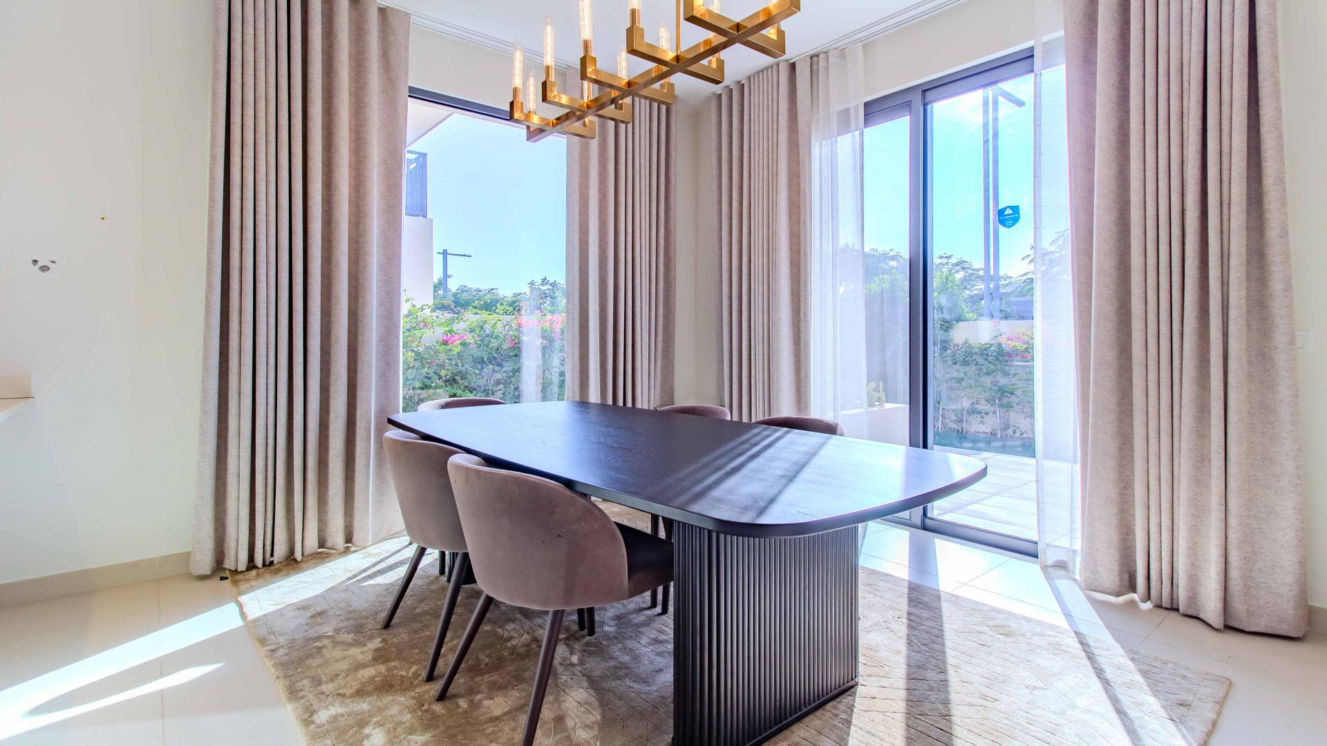 Exterior view of a modern five-bed villa in Maple, Dubai Hills Estate for rent