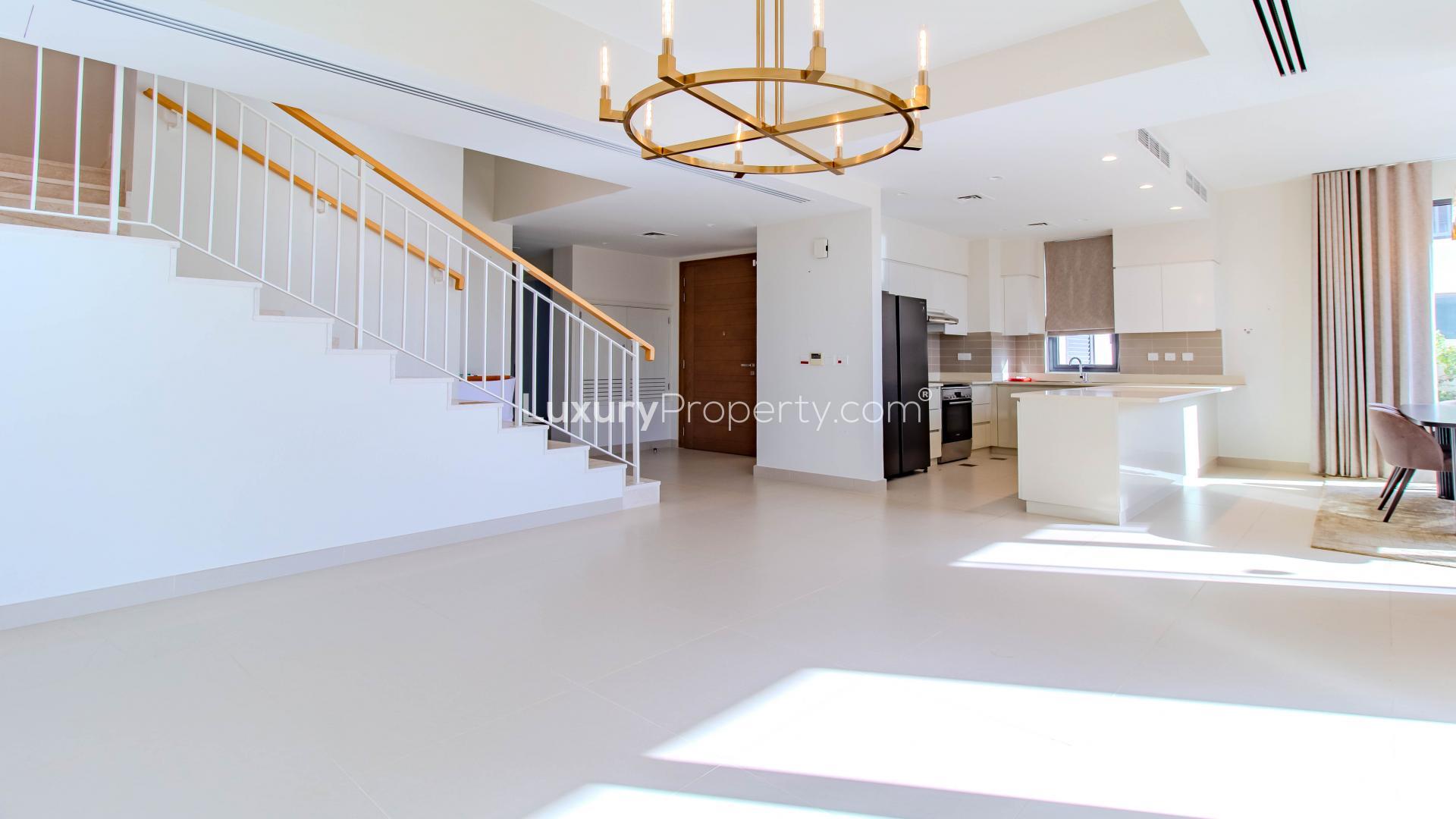 Serene five-bedroom villa exterior with garden in Maple, Dubai Hills Estate, available for rent