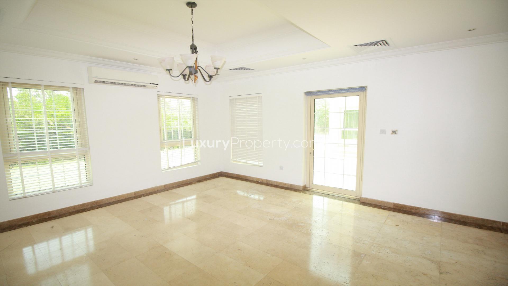 Bright living room with large windows in Jumeirah Islands luxury villa, Cluster 14