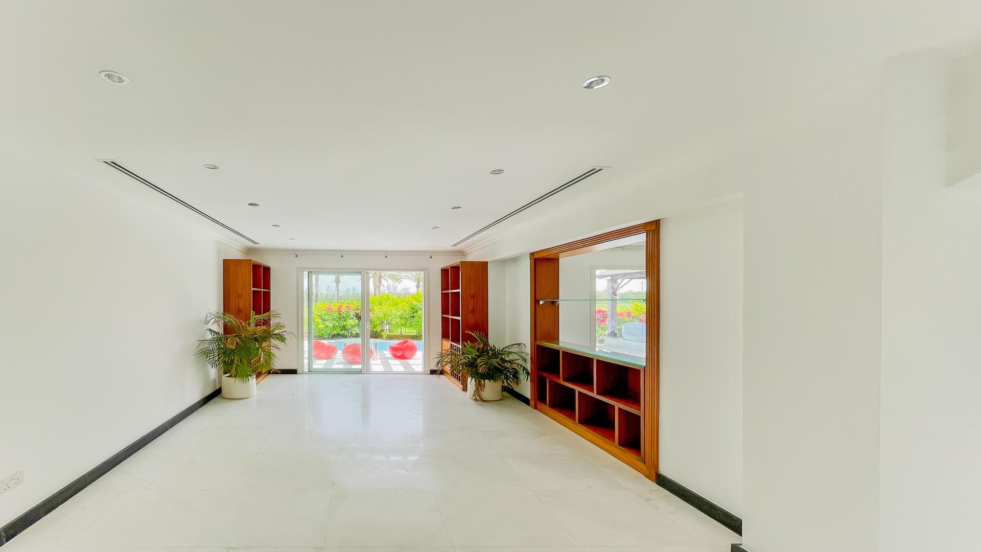 Upgraded villa balcony overlooking golf course in Meadows 4, available for rent