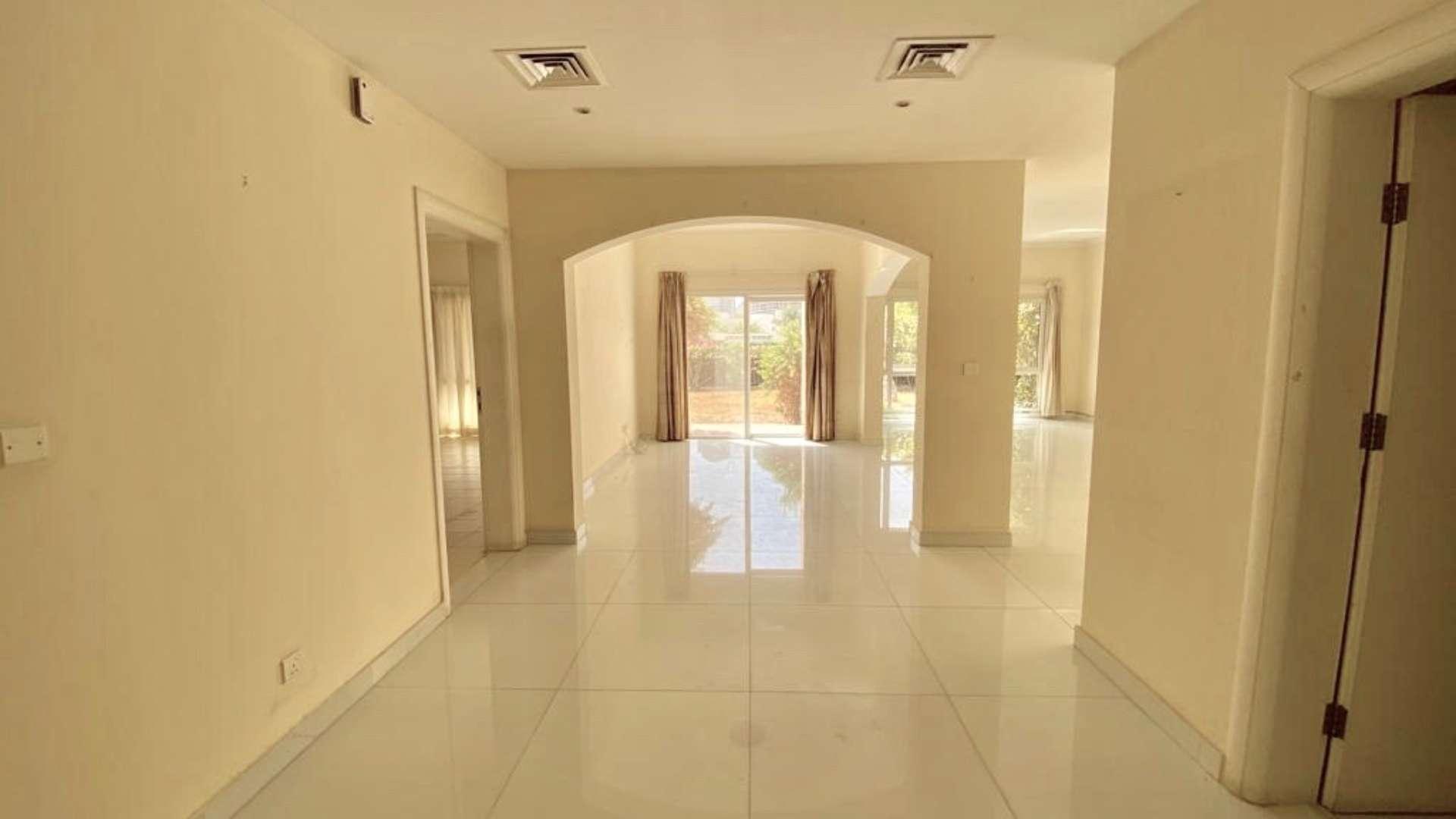 Spacious living area in Meadows 2, Type 7 villa with large windows and bright interior