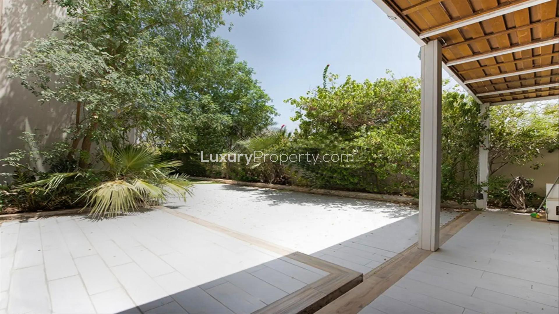 Luxurious villa garden with lush greenery in Millennium Estates, Meydan Gated Community