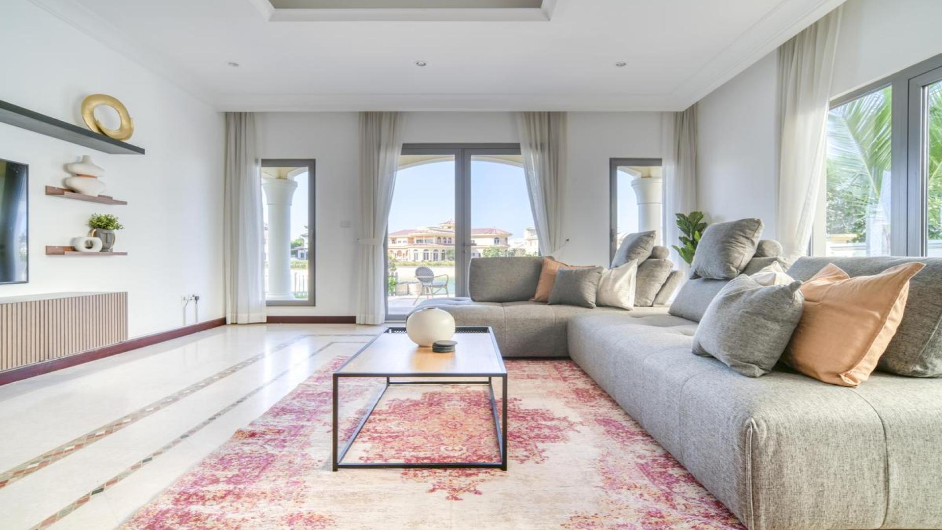 Luxury villa patio with waterfront view in Palm Jumeirah's Garden Homes community