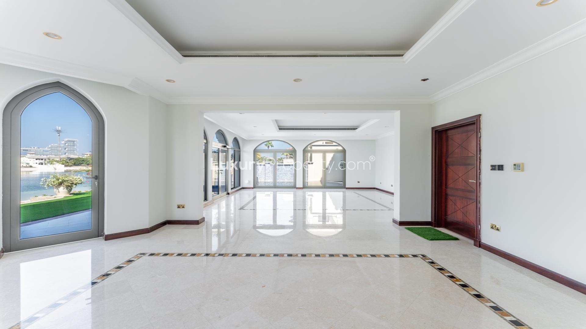 Luxurious 5-bedroom Mediterranean-style villa exterior on Palm Jumeirah, available for rent