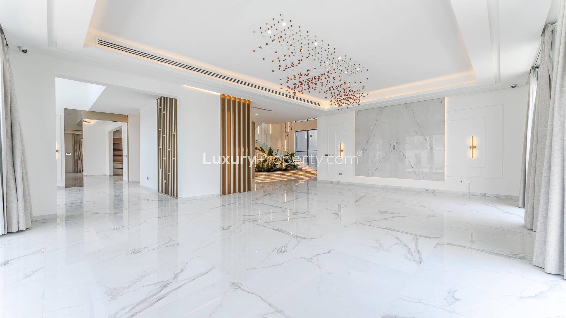 Luxurious villa entrance with marble floors, elevator, and modern design in Dubai Hills Estate