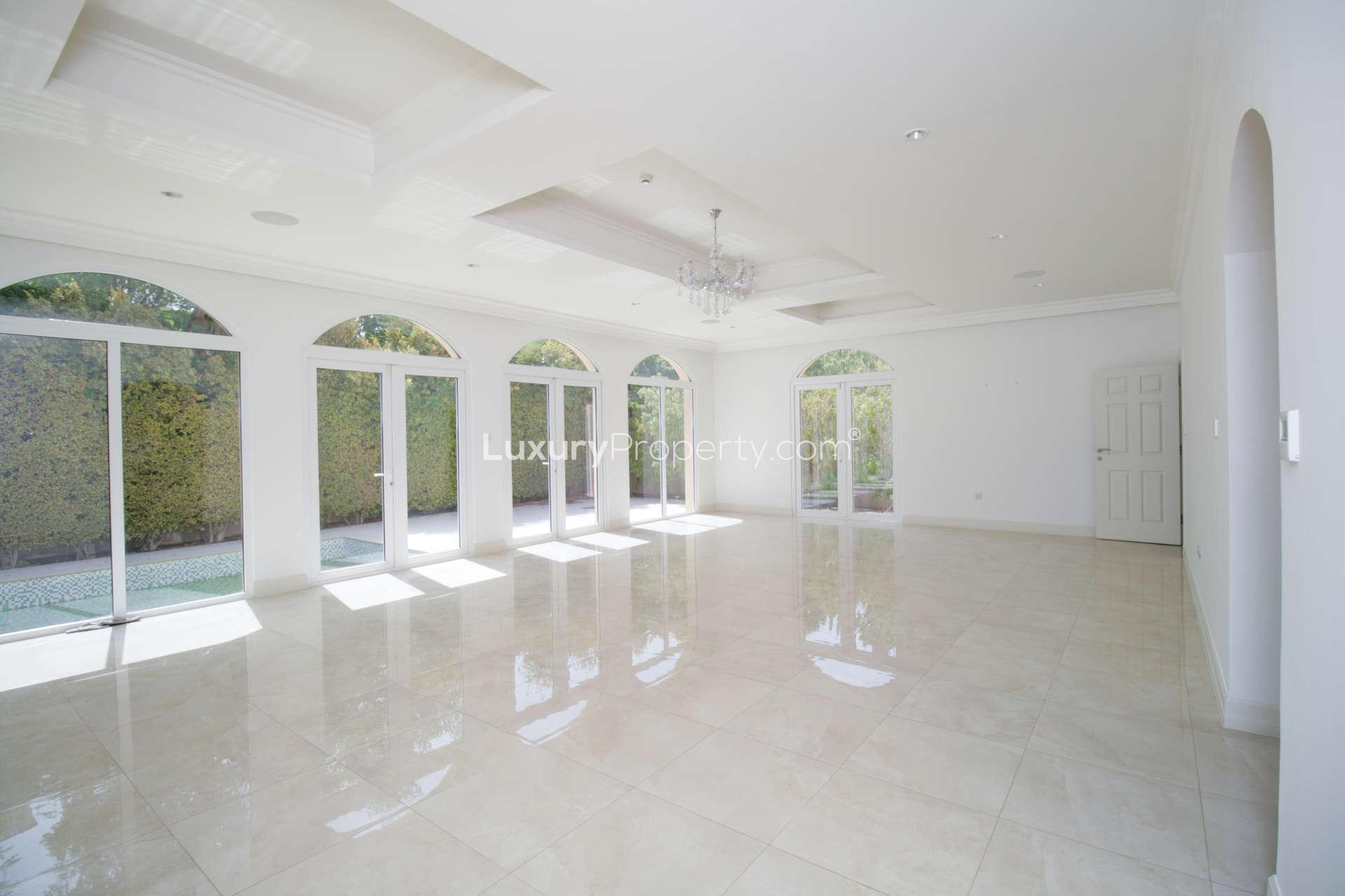Spacious living room in 5-bedroom villa, Olive Point, Jumeirah Golf Estates for rent