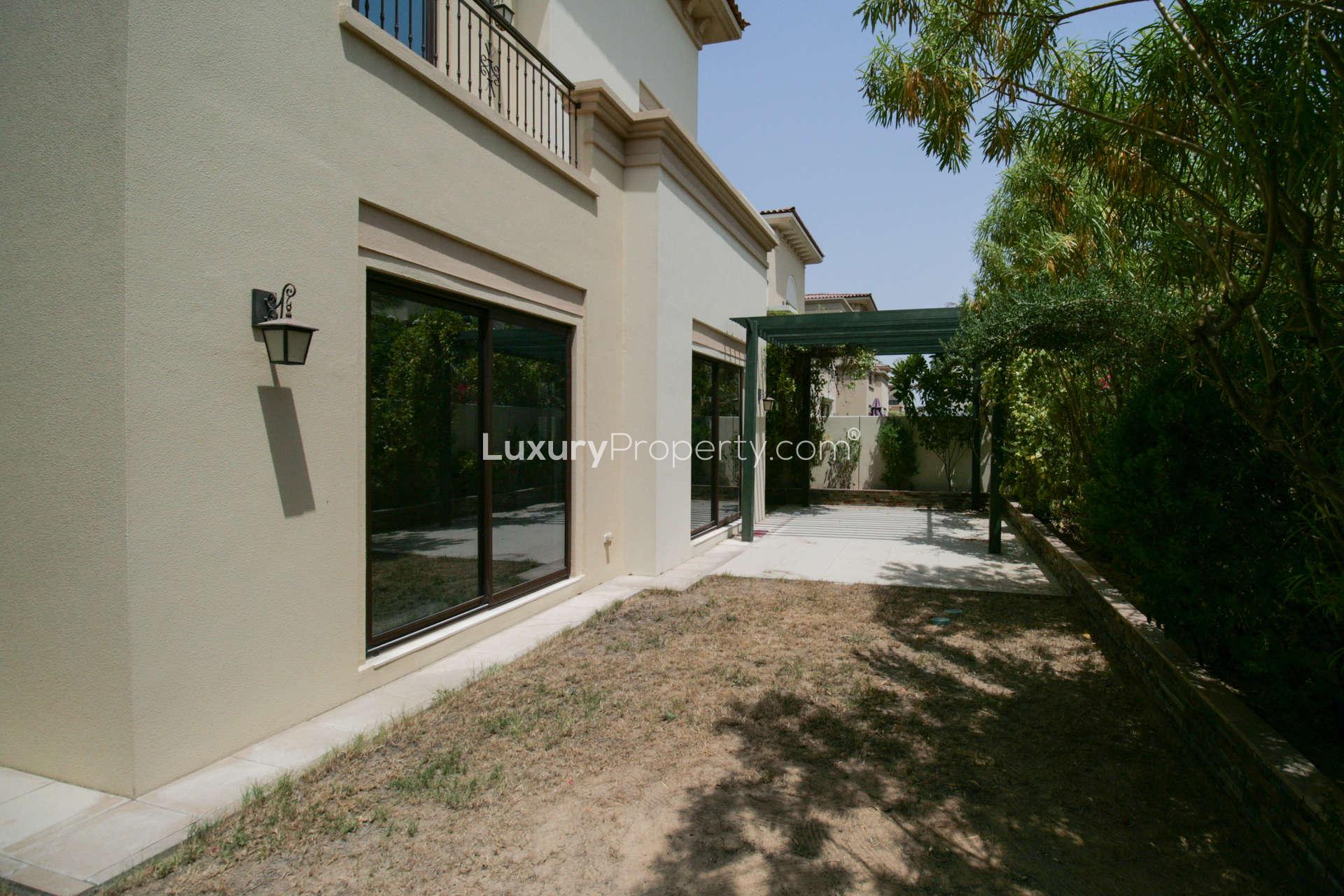 Spacious living area in 5-bedroom villa, Palma, Arabian Ranches 2, with large windows