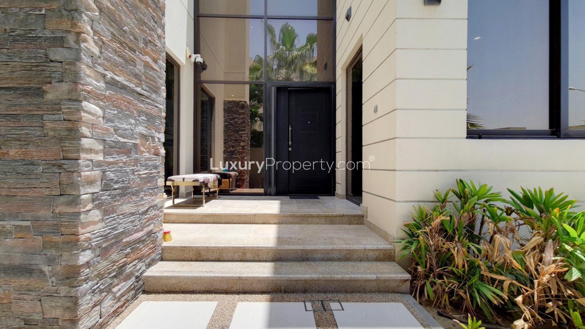 Exterior view of a modern villa in Damac Hills, Picadilly Green, available for rent