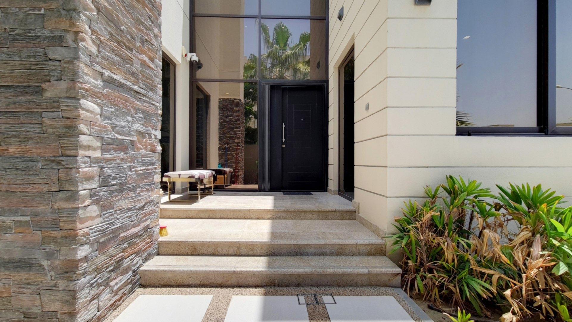 Exterior view of a modern villa in Damac Hills, Picadilly Green, available for rent