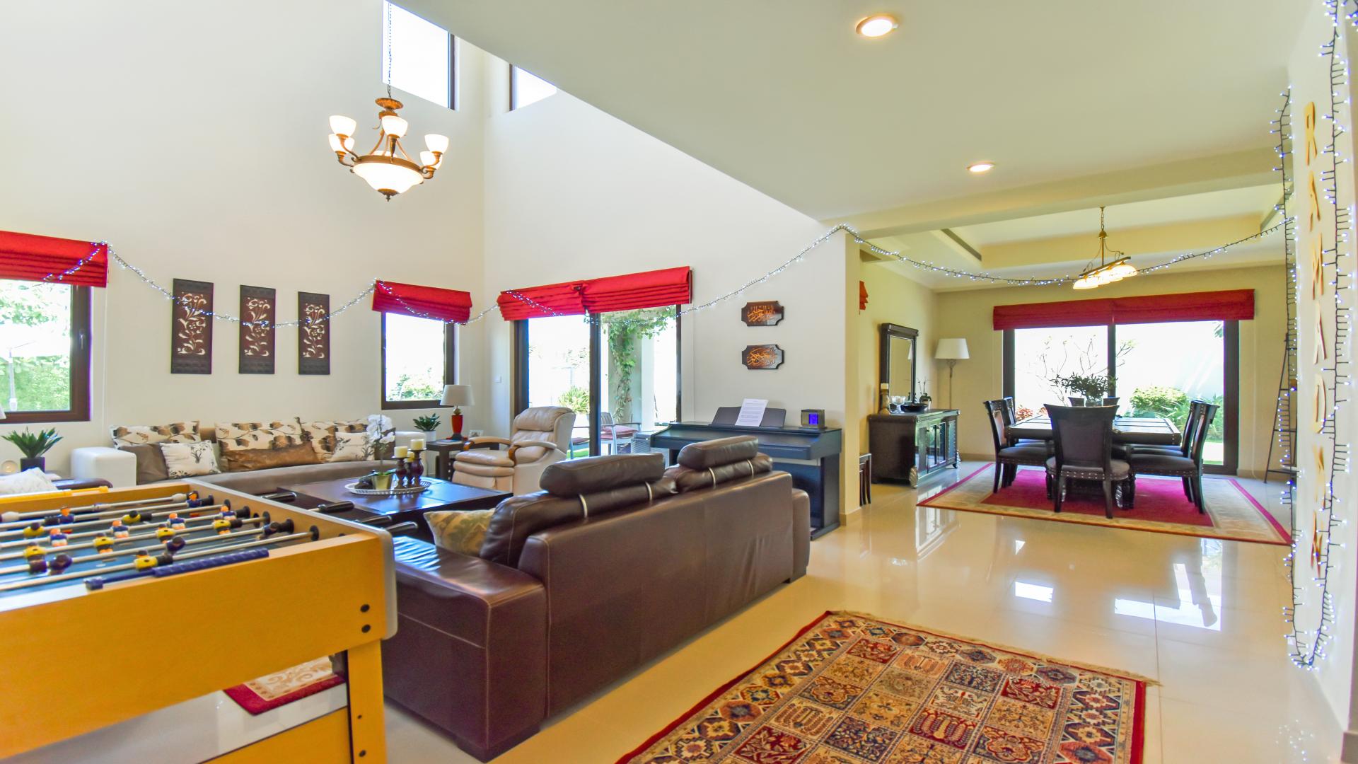 Beautiful villa exterior with landscaped garden in Arabian Ranches 2, Rasha community, for rent