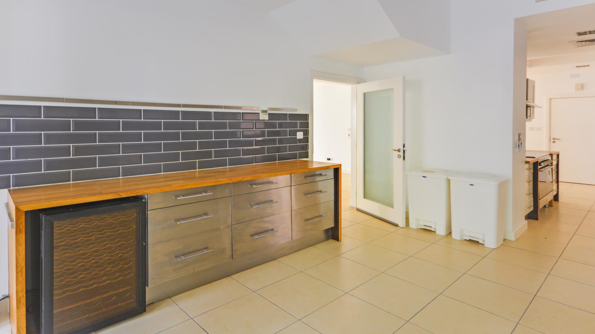 Modern kitchen in 3-bedroom villa, Saheel 1, Arabian Ranches. Spacious layout with sleek finishes