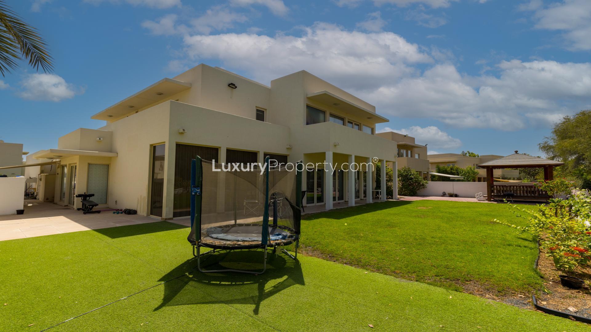Luxurious living room in 5-bedroom villa, Saheel 1, Arabian Ranches, with modern decor