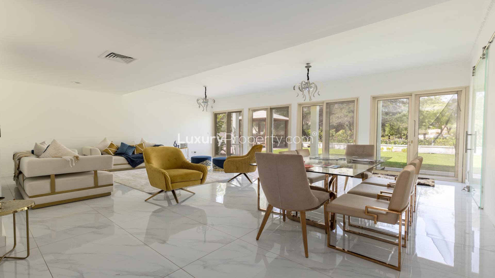 Luxurious living room in 5-bedroom villa, Saheel 1, Arabian Ranches, with modern furnishings