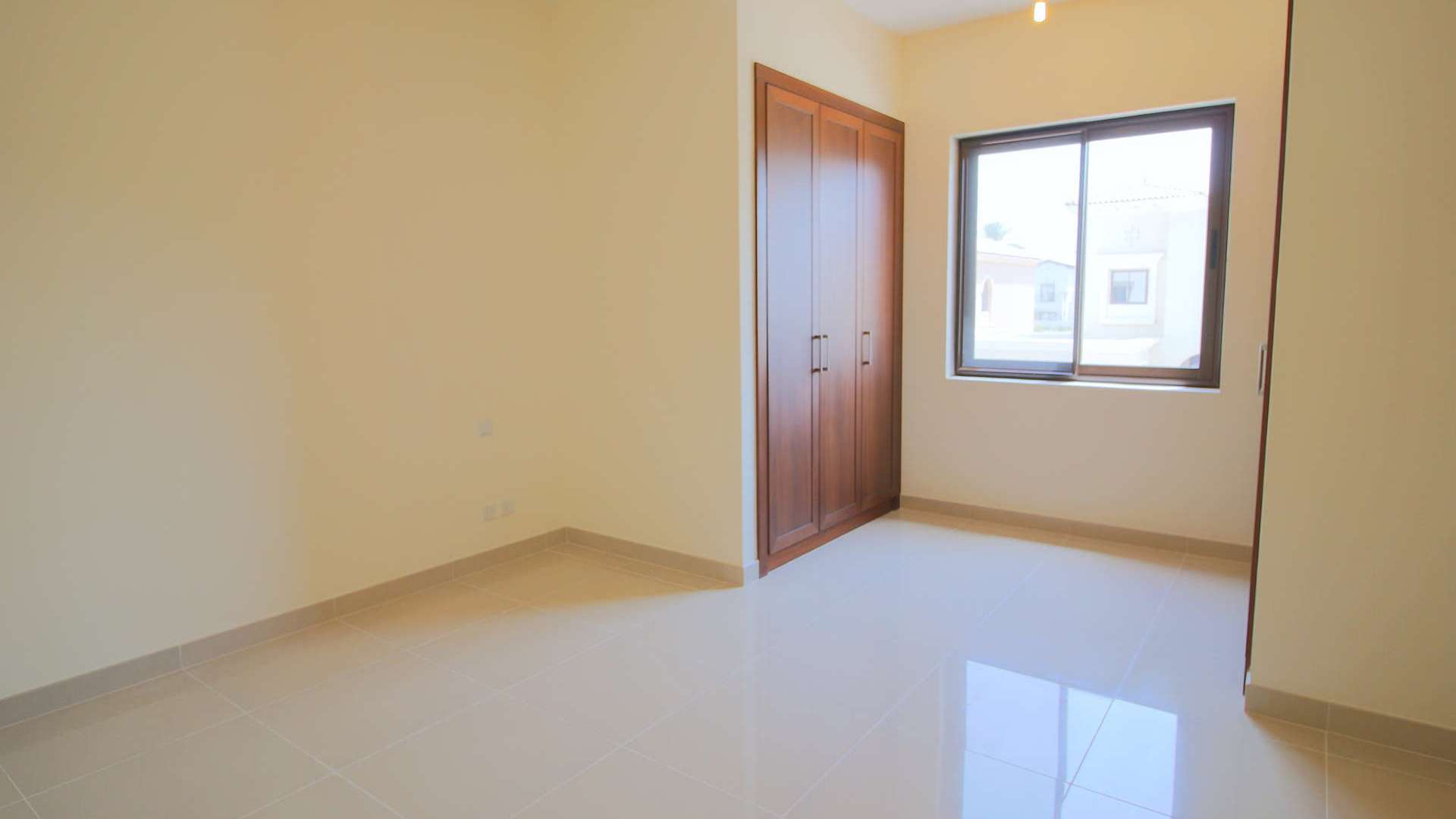 Empty room with large windows in Samara villa, Arabian Ranches 2, available for rent
