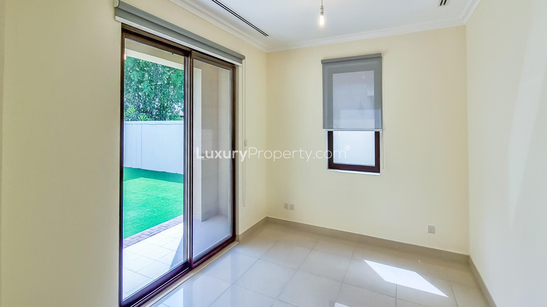 "Bright room with sliding doors, garden view in Samara villa, Arabian Ranches 2, for rent.","Spacious living room in Samara villa, Arabian Ranches 2, with sliding glass doors.",Spacious villa interior with large windows, Arabian Ranches 2, Samara community, LP12963
